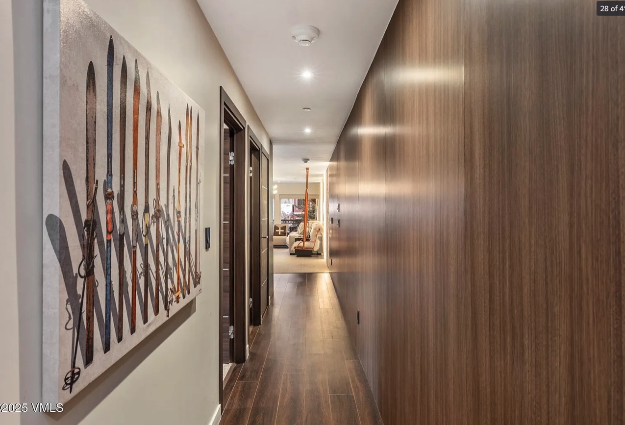 Hallway in a Vail Valley condo with ski display